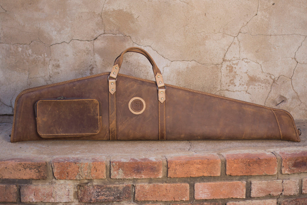 Premium full-grain leather rifle bag by Mark of Legend, available from Yisipho in Salvador Choc and Zebra/Oxblood.